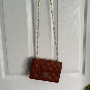 Never used small brown purse with gold chain strap